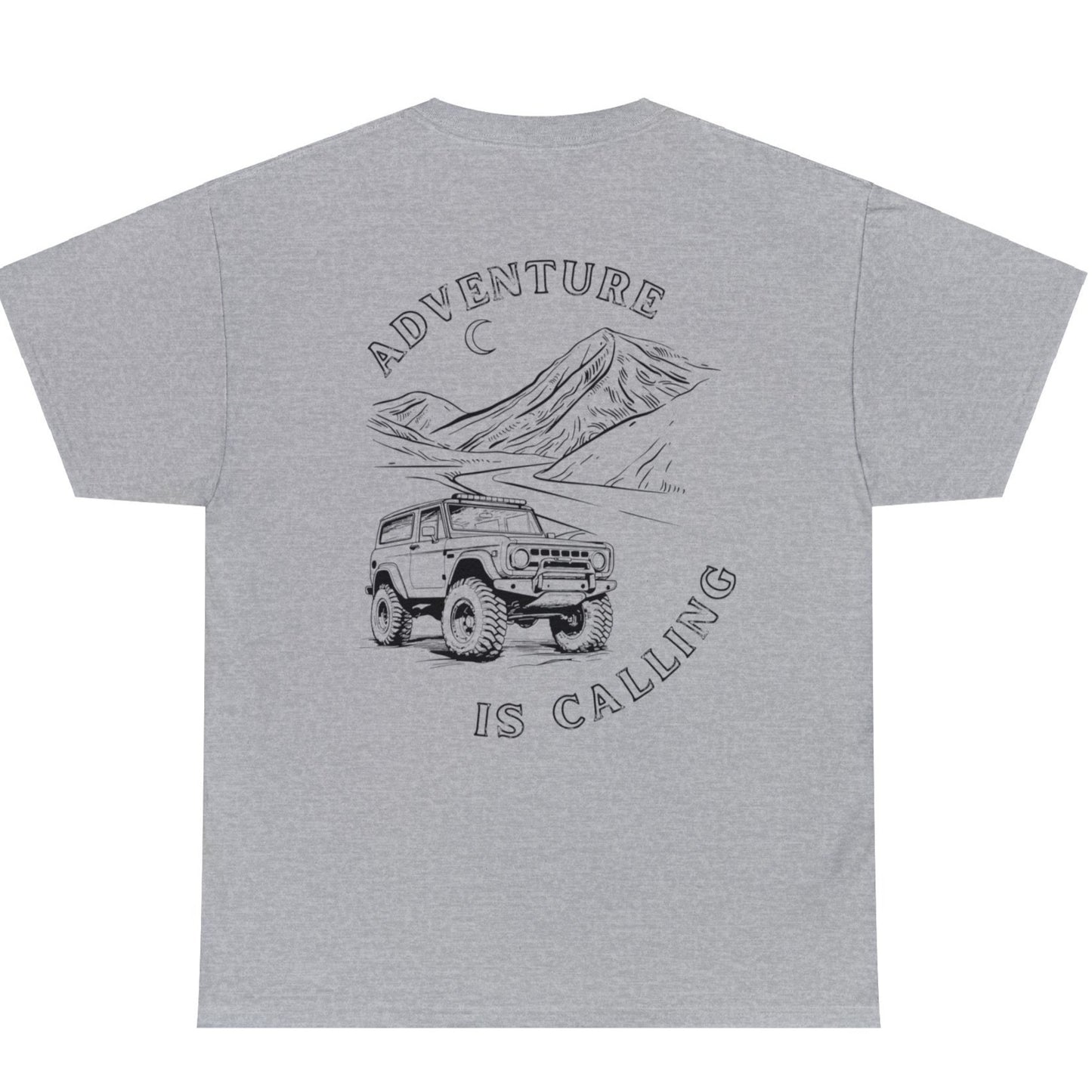 Adventure is calling t-shirt, young man wearing grey t-shirt showing mountains and off road suv driving in desert , jeep, traveling