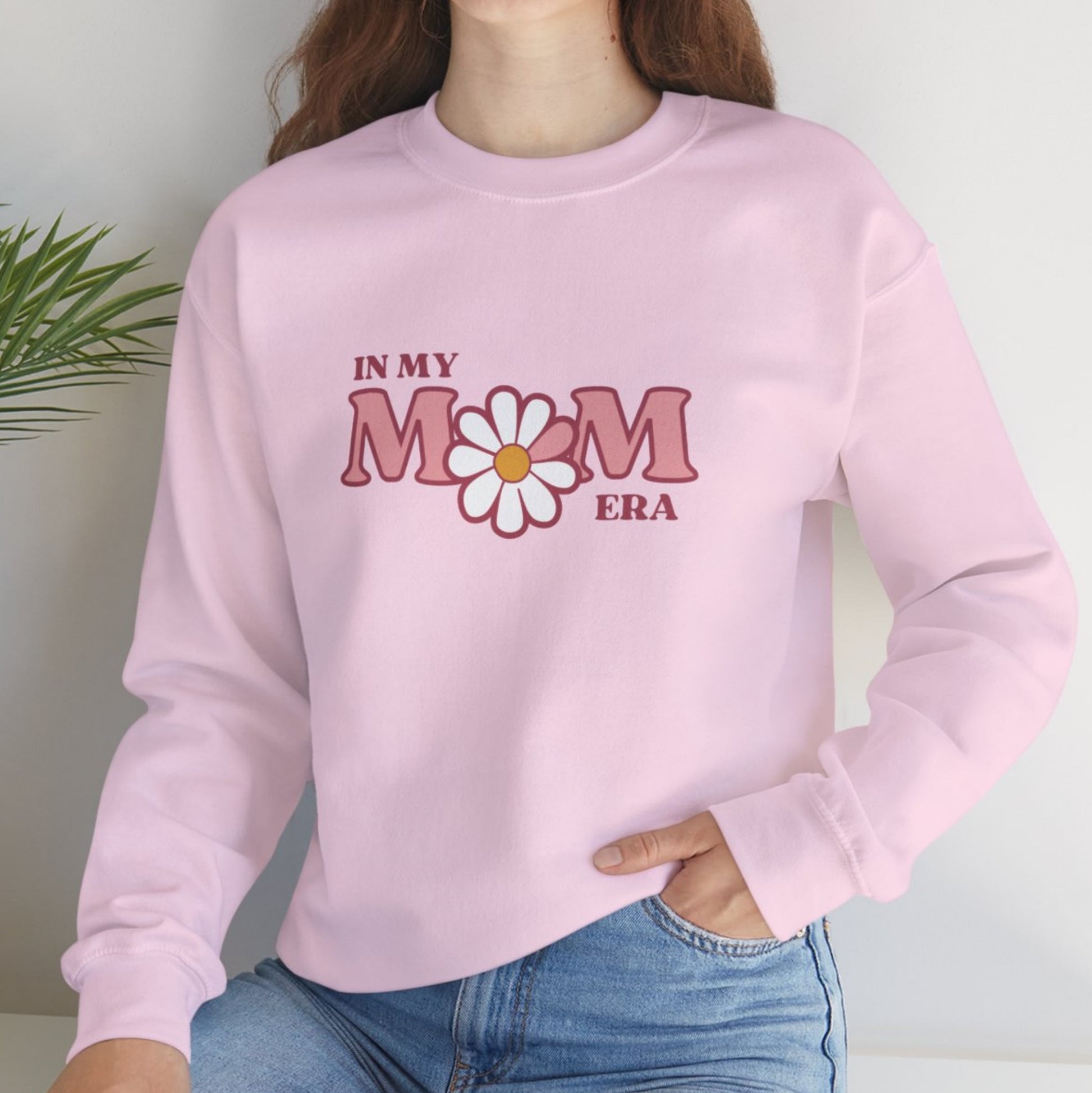 pink comfortabla in my mama era sweeatshirt with daisy flower, all in shades of pink and maroon